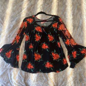 Floral top with bell bottom sleeves